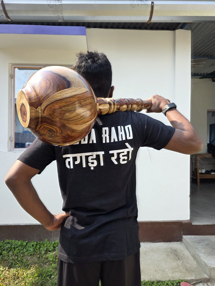Niku training with mudgar and gada clubs